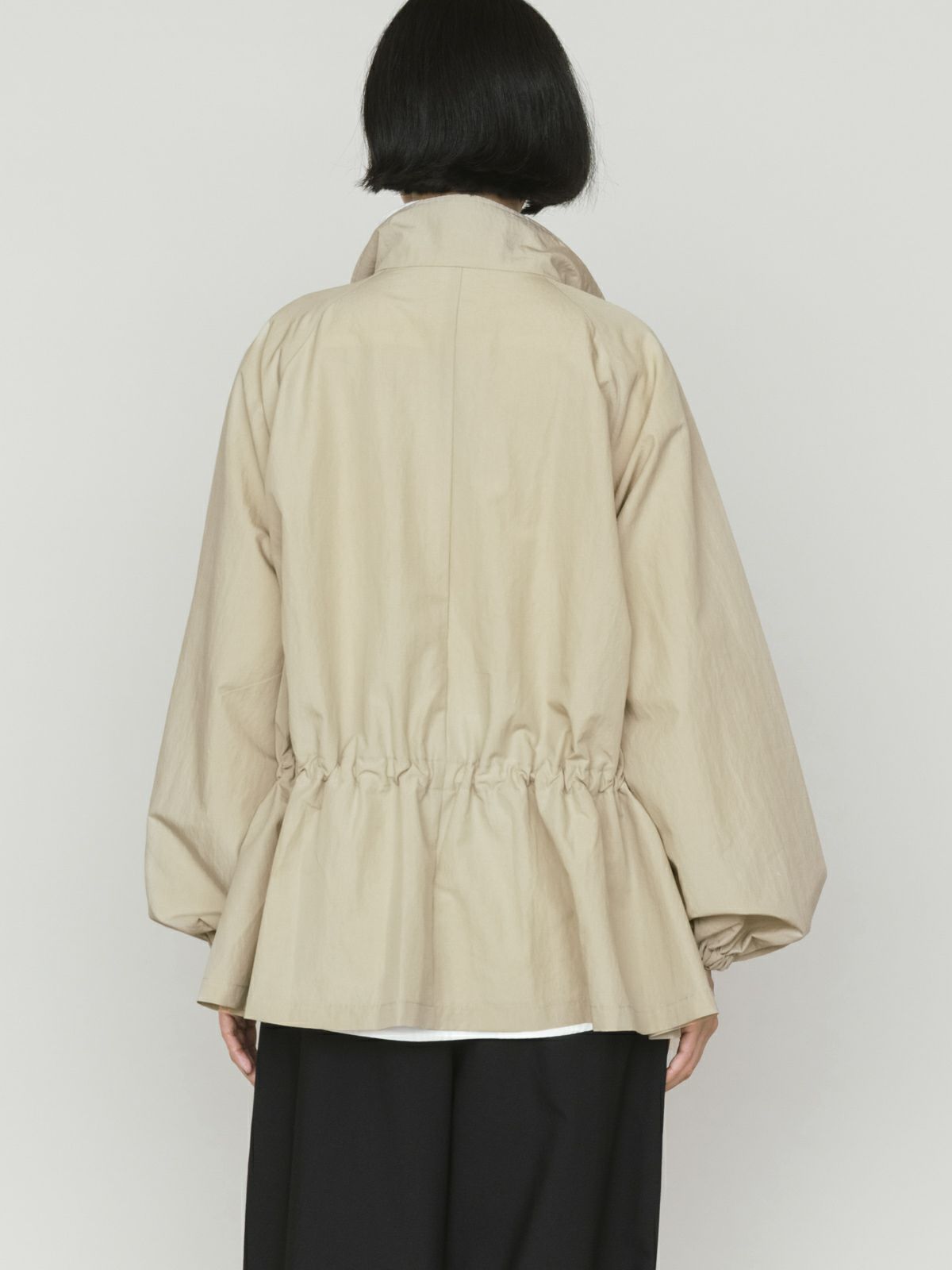 tent line zip blouson