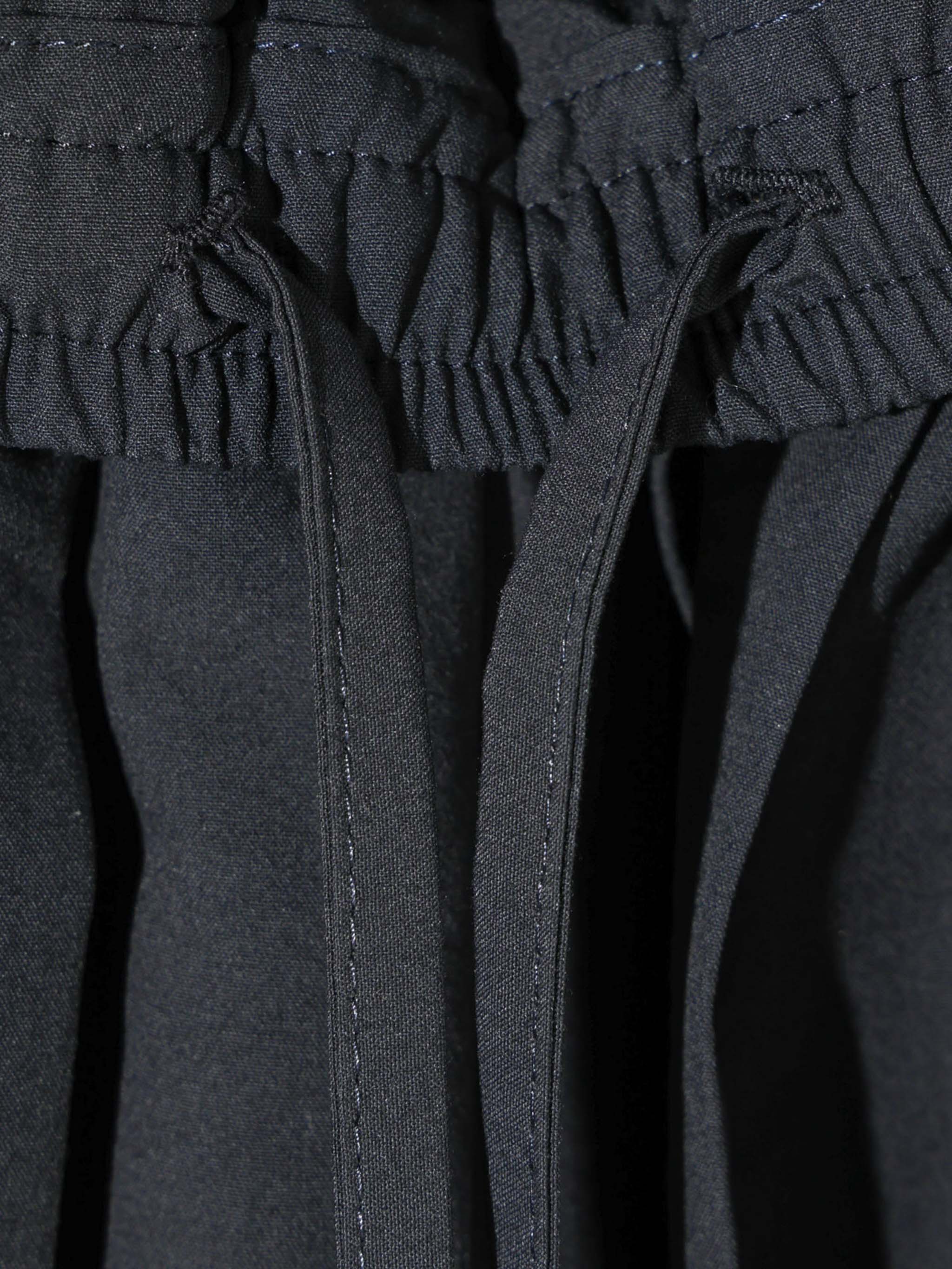 asymmetry pleats skirt