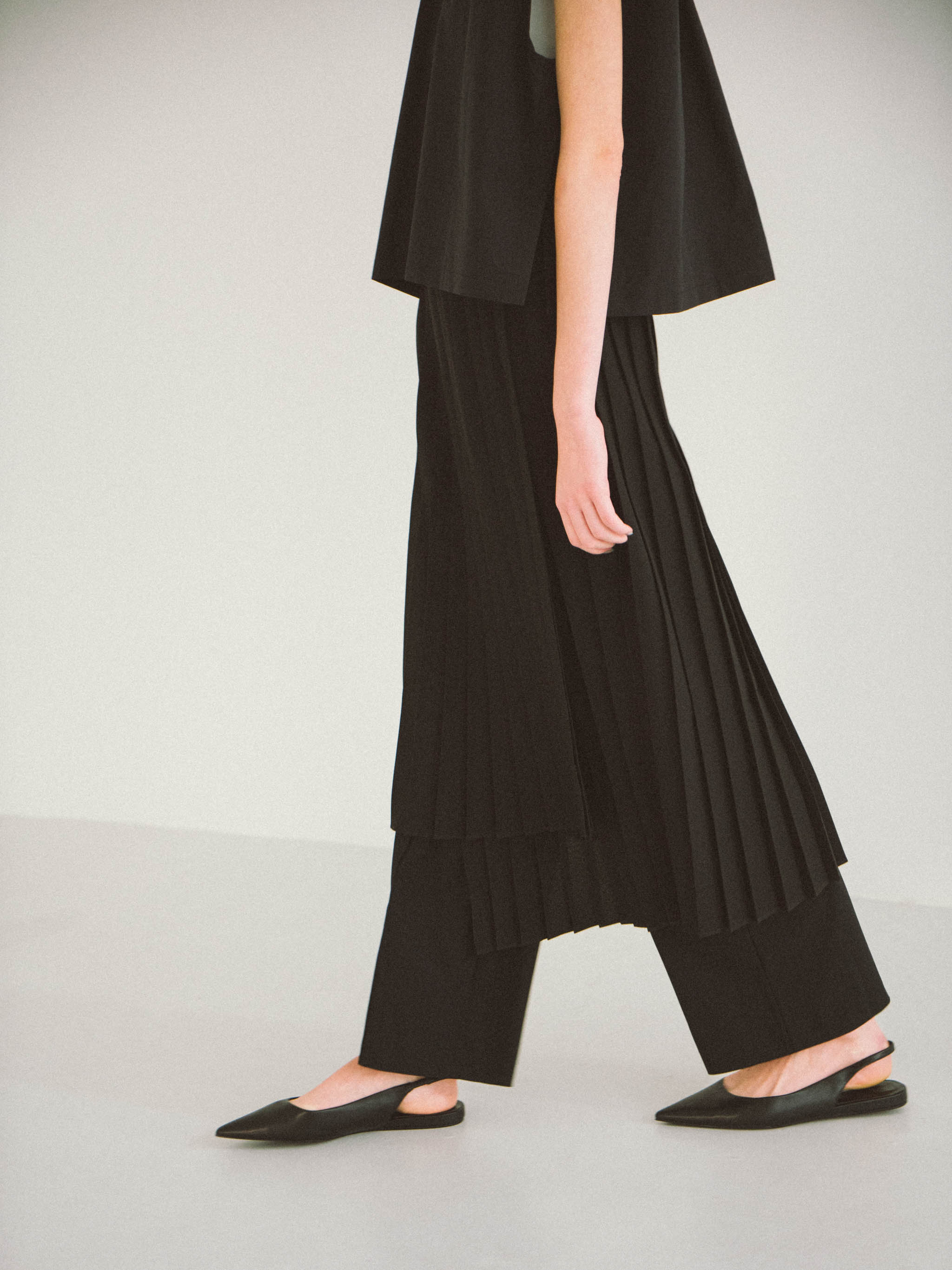 asymmetric hem wrap pleated skirt