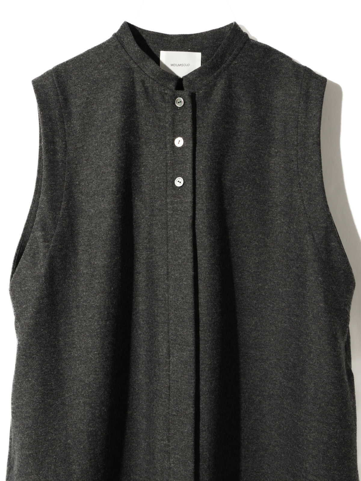mini gilet one-piece